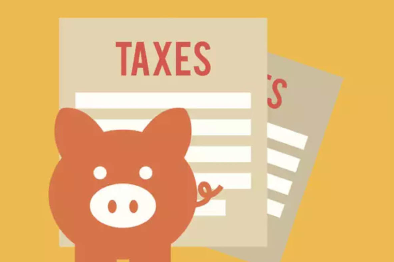 An image with Taxes written and a picture of piggy on the front.